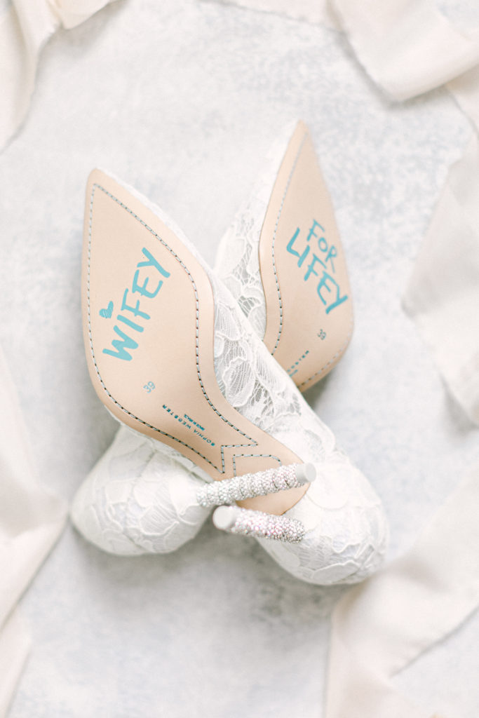 brides shoes with writing on the bottom for Boston State Room Wedding