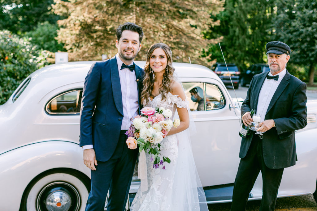 bride and groom in rolls royce for luxury boston wedding